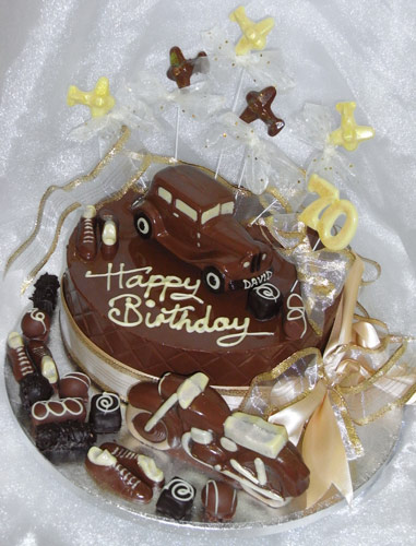 Large single tier of chocolate celebrating 70th birthday