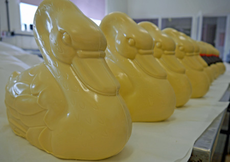 a picture of undecorated white chocolate swans ready for delivery to itv emmerdale