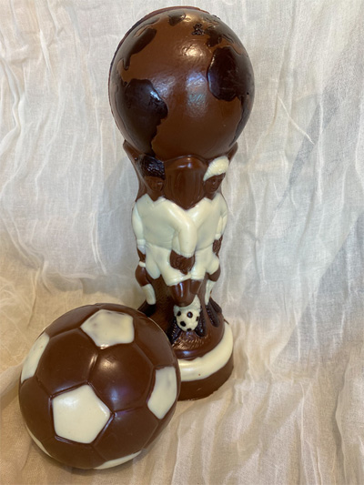 a picture of a chocolate world cup and football